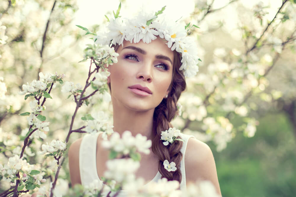 Woman showing off creative hairstyles for the spring