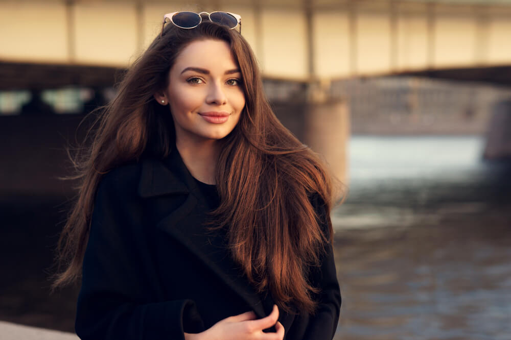 Profile of Young Woman Lying on Floor on Elbows with Her Long Silky Thick  Straight Hair Falling Over Her Shoulder Stock Image - Image of hair,  bottle: 206022341