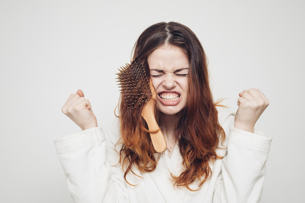 Woman with hair tangles