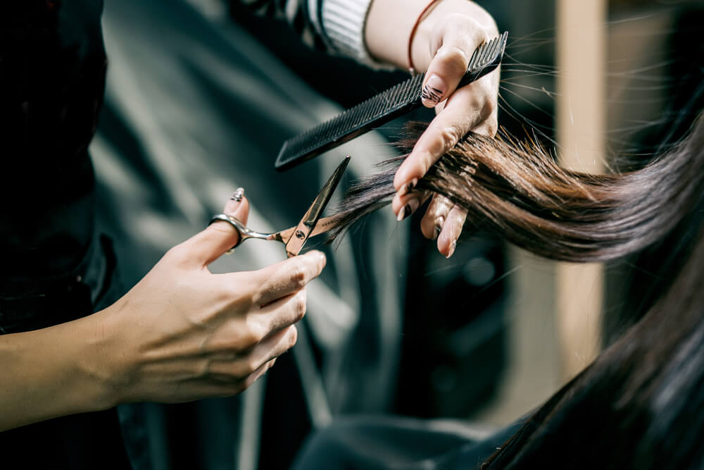 Woman having haircut