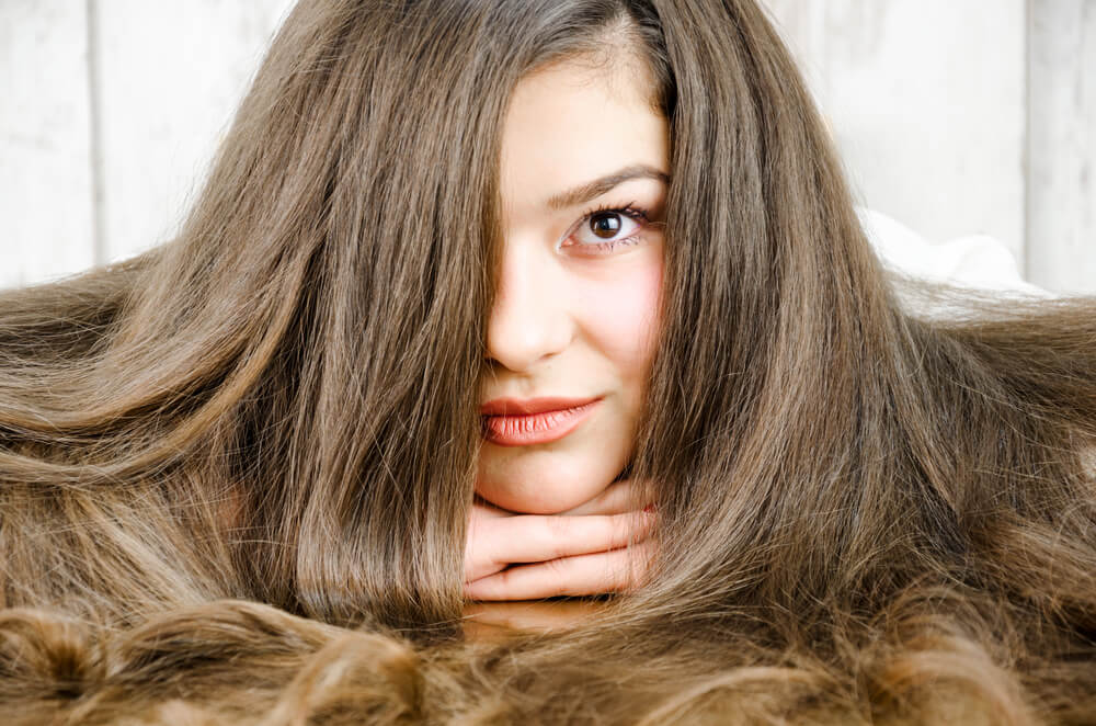 9 Tips for Taming & Styling Thick Hair - HerStyler
