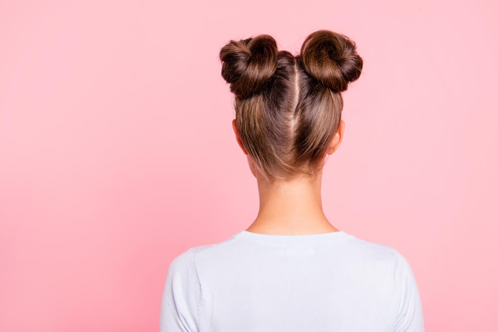 girl with two hair buns