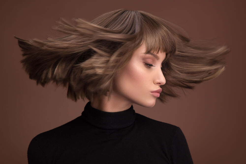 side profile of woman with short hair