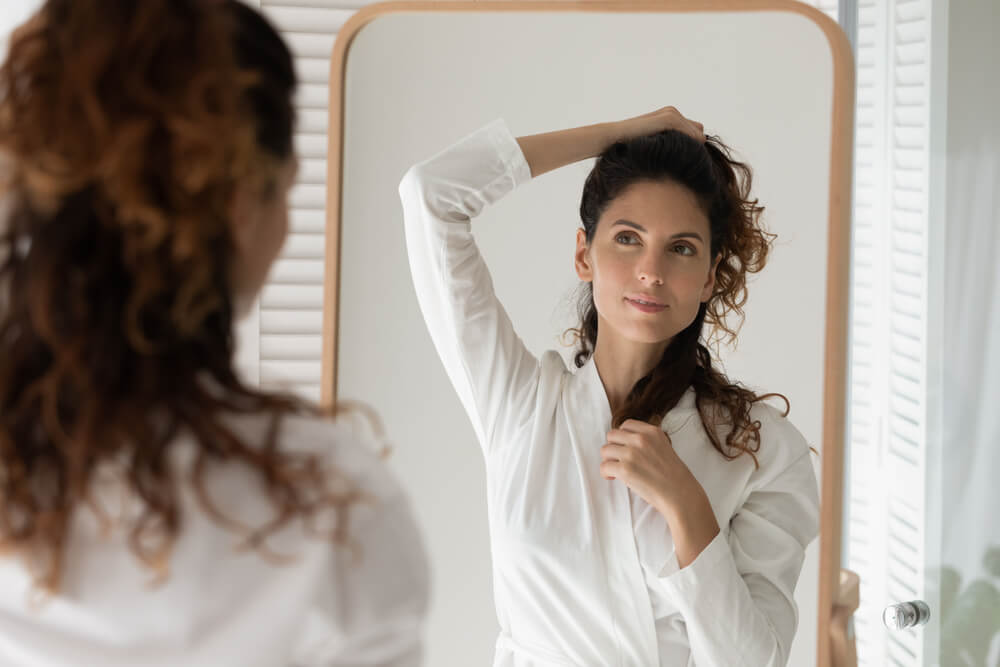 woman holding hair