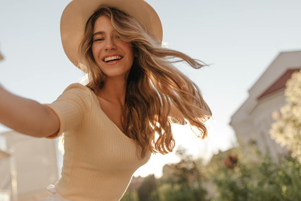 girl wearing hat